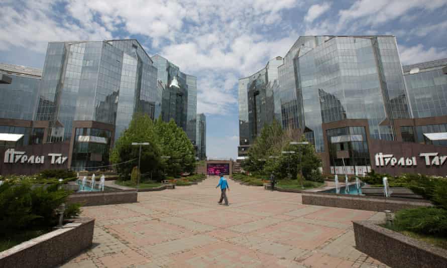 A man walks through the grounds of the Nurly Tau business centre in Almaty, the former capital of Kazakhstan.