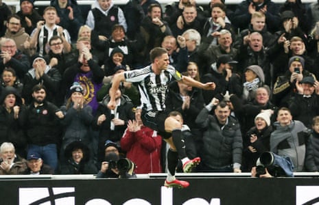 Newcastle United's Sven Botman celebrates scoring their first goal.