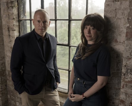 Rob Rinder and Dr Fern Riddell stand next to a window