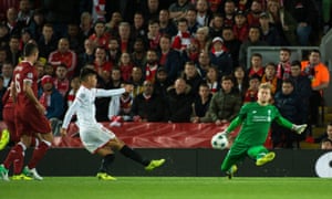 Sevilla’s Joaquin Correa scores the equaliser at Anfield