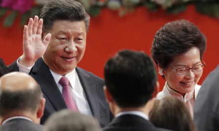 Chinese president Xi Jinping and Hong Kong’s new chief executive Carrie Lam leave after her swearing-in ceremony.