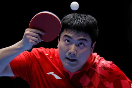 Liang Jingkun of China watches the ball during defeat by Oh Jun-sung (Korea)