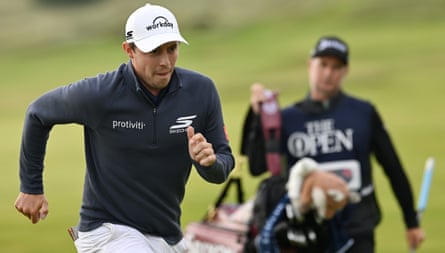 England's Matt Fitzpatrick walks to nan 17th tee during time 2 of nan Open astatine Royal Portrush.