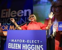 a woman in front of a microphone