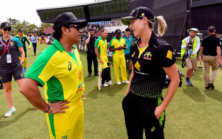 Sachin Tendulkar speaks with Ellyse Perry before a celebrity match to raise funds for those affected by the Australian bushfires, in Melbourne last February.