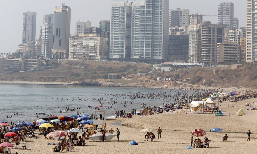 People gather at a public beach on Ramlet al Bayda seaside in Beirut, Lebanon August 2, 2015.
