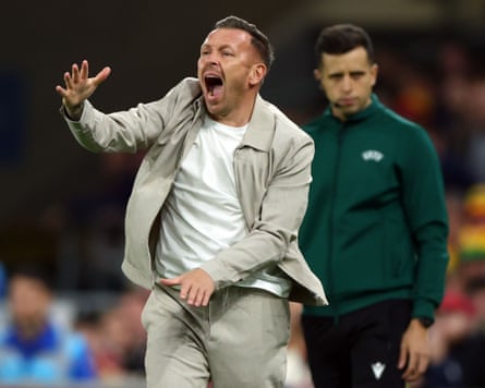 Craig Bellamy cuts some shapes on the touchline during the match against Norway.