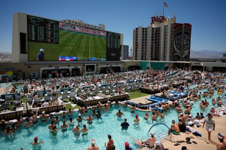 Fans watch the US win against Australia from the pool in Las Vegas