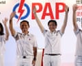 Singapore's prime minister and secretary general of the ruling People's Action Party (PAP), Lawrence Wong, (C-R) waves to supporters with his team