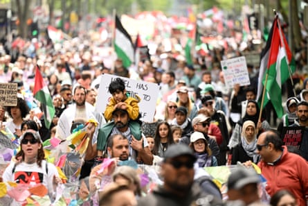 Protesters march in Melbourne on Sunday
