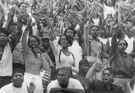 Students wave pompoms
