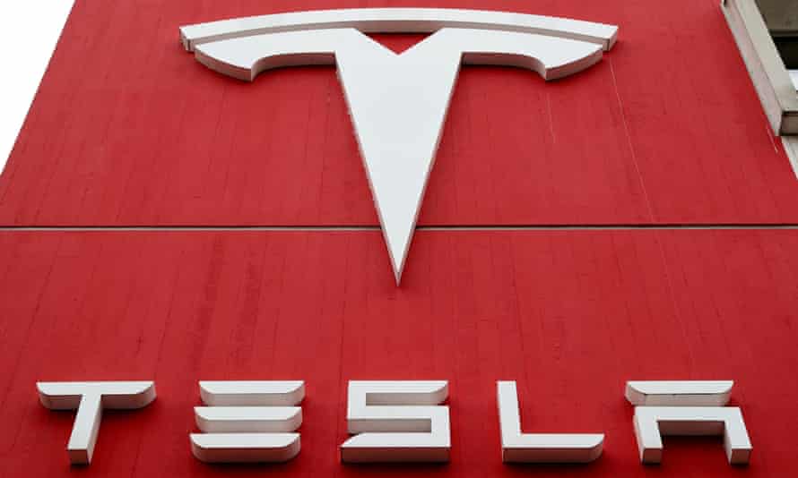 The logo of car manufacturer Tesla at a branch office in Bern, Switzerland.