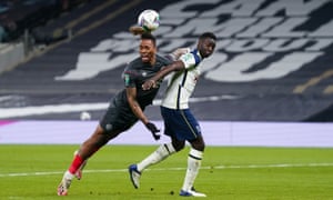 Tottenham Hotspur v Brentford: Carabao Cup semi-final – live! | Football 6 Ivan Toney of Brentford gets a header in on goal ahead of Davinson Sánchez of Tottenham Hotspur.