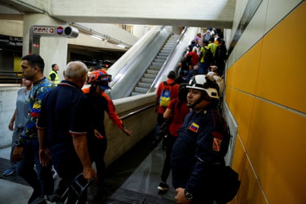 people leave a subway station