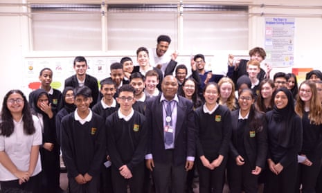 Francis Elive with his class of high achievers at Fitzalan High school in Cardiff.