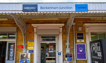 Beckenham (Greater London), Kent, UK. Entrance to Beckenham Junction railway station with station sign and card readers looking through to platform.<br>2C80M2F Beckenham (Greater London), Kent, UK. Entrance to Beckenham Junction railway station with station sign and card readers looking through to platform.