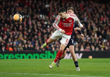 Gabriel Martinelli heads at goal against Wigan