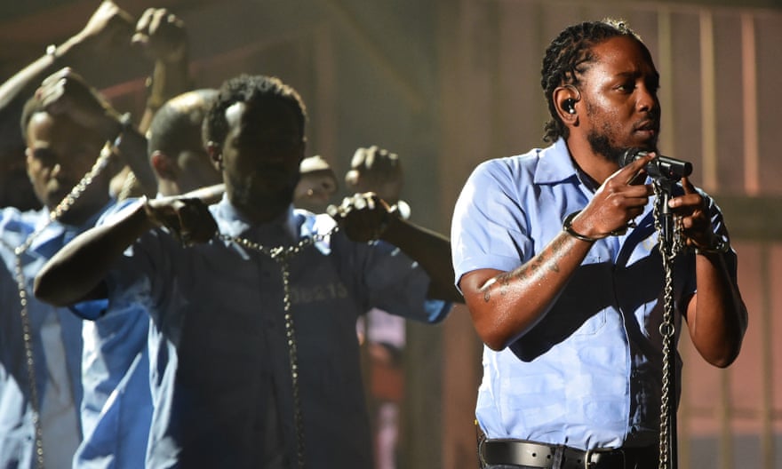Kendrick Lamar performs onstage at the Grammys