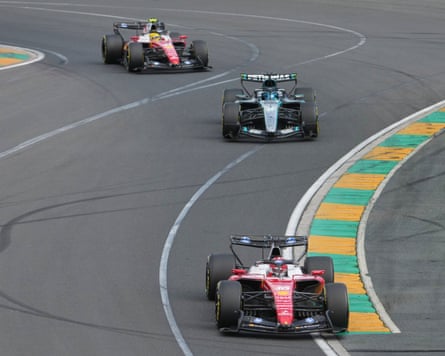 George Russell (centre) battles with the Ferraris of Charles Leclerc and Lewis Hamilton in a dramatic early tussle.