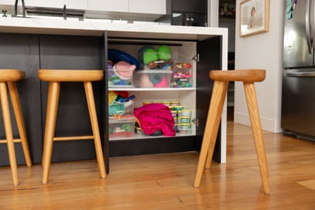 Neurodivergent-friendly toys and crafts are kept under the kitchen bench at Clonan’s house.