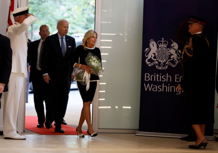 Joe Biden and first lady Jill Biden arrive to pay respect at the British embassy.