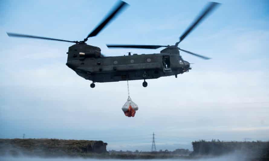A Royal Air Force Chinook helicopter helping repairs to a damaged river bank in Lancashire in 2015.