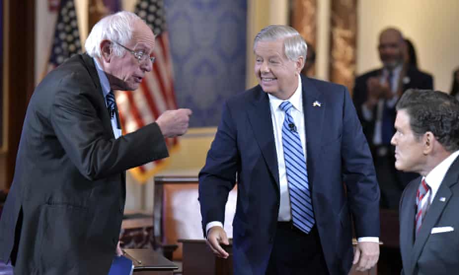 Bernie Sanders with Lindsey Graham and Fox host Bret Baier after the debate.