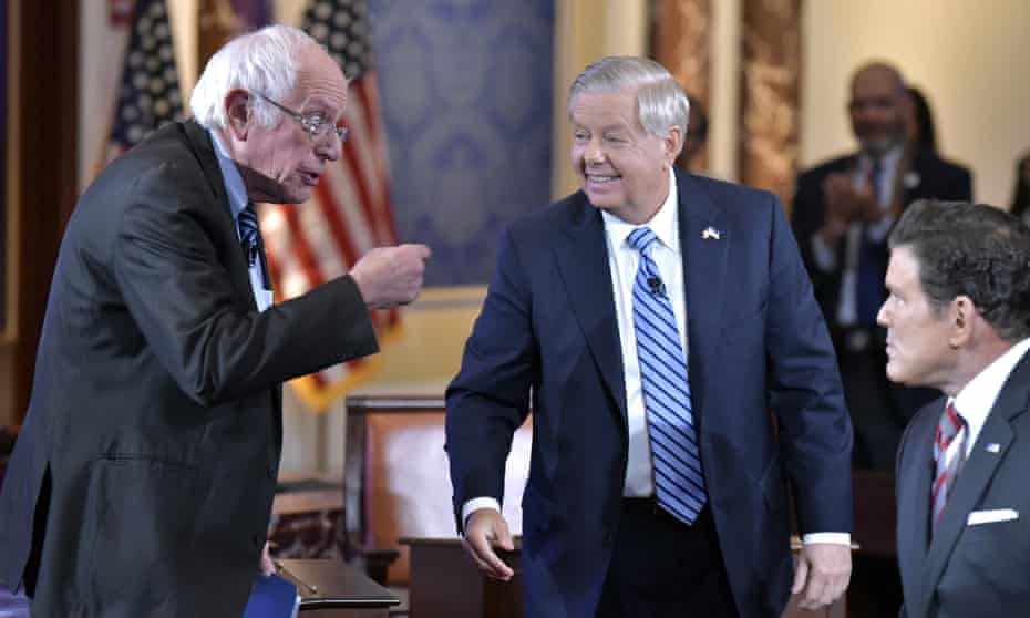 Bernie Sanders with Lindsey Graham and Fox host Bret Baier after the debate. 