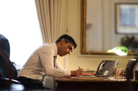 Rishi Sunak working in his office