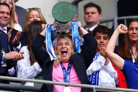 Emma Hayes lifts the FA Cup after her team’s victory at Wembley.