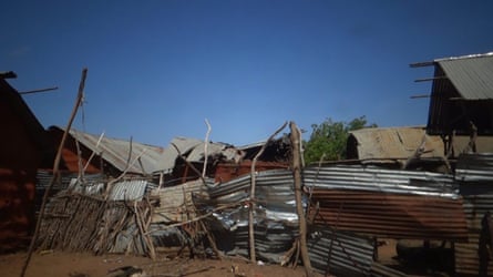 Buckled sheets of metallic astir shacks