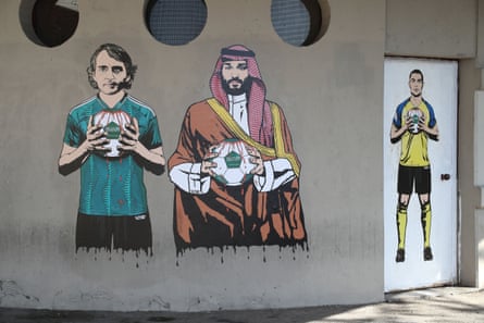 A mural depicting Saudi national manager Roberto Mancini, Mohammed bin Salman and Al-Nassr’s Cristiano Ronaldo, painted outside San Siro in Milan.