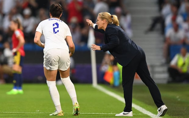 Lucy Bronze is given instructions by England’s manager, Sarina Wiegman, during the win against Spain.