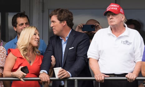 Trump with Tucker Carlson and Marjorie Taylor Greene at the LIV Golf event at his Bedminster golf club last weekend.
