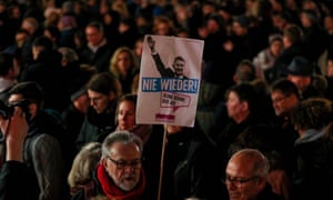 A placard showing the AfD regional leader Björn Höcke reads ‘Never again’ during a vigil in Hanau on Thursday.