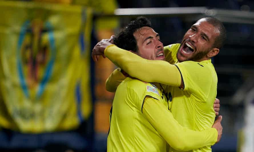 Dani Parejo celebrates with Étienne Capoue after equalising for Villarreal.