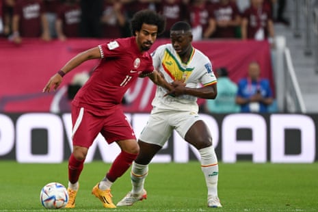 Qatar v Senegal: World Cup 2022 – live | World Cup 2022 3 Akram Afif evades the interest of Nampalys Mendy.