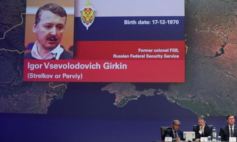 A picture of Russian national Igor Girkin is shown on screen as international investigators present their latest findings in the downing of Malaysia Airlines flight MH17