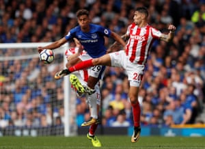 Everton’s Dominic Calvert-Lewin and Stoke’s Geoff Cameron challenge for a high ball.