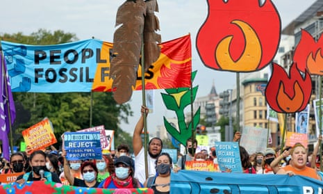 Environmental activists hold climate change protest in Washington<br>Environmental activists march to the U.S. Capitol during the final day of weeklong climate change protests in Washington, U.S., October 15, 2021. REUTERS/Evelyn Hockstein