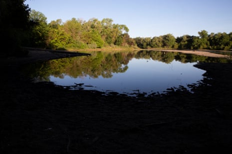 The drought-stricken American River is too warm for salmon to travel to the Pacific Ocean.