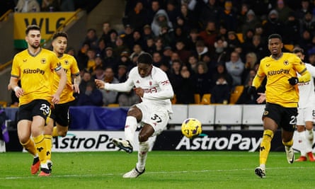 Kobbie Mainoo strikes for Manchester United at Molineux.