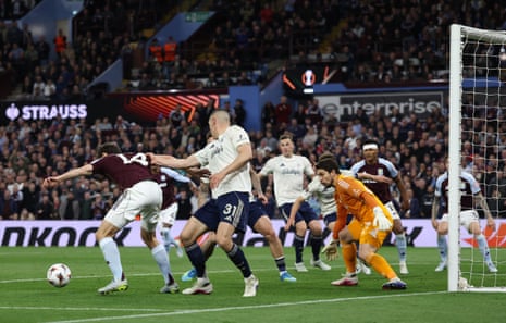 Nottingham Forest's Serbian defender #31 Nikola Milenkovic pulls the shirt of Aston Villa's Spanish defender #14 Pau Torres to concede a penalty