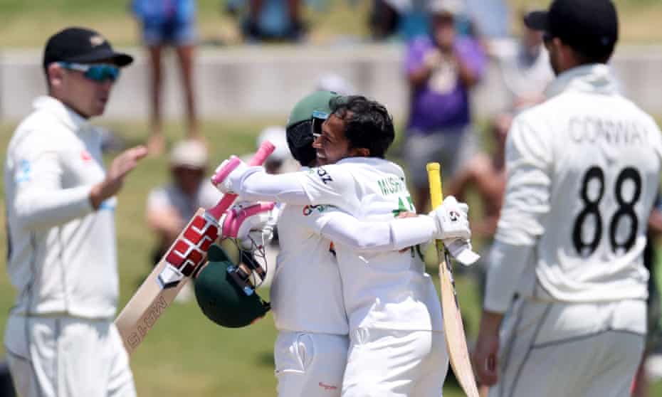 Mominul Haque and Mushfiqur Rahim celebrate after securing an eight-wicket win at Mount Maunganui