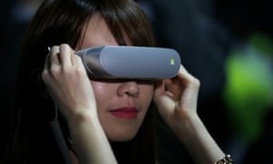 A woman uses a VR headset