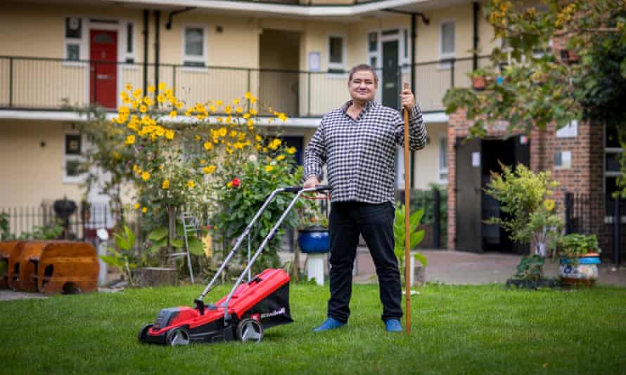 Ivan Markov with his new cordless lawnmower.