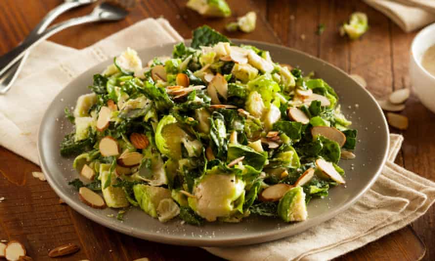 kale and brussels sprout salad with almonds.