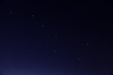 Stars of the Plough constellation in the night sky.