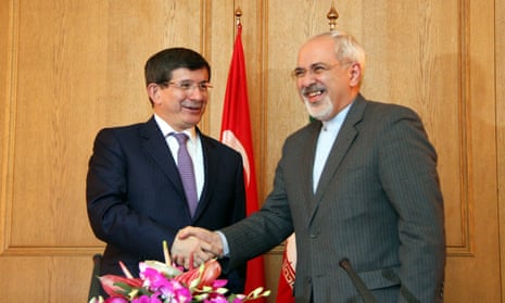 Turkish foreign minister Ahmet Davutoğlu, left, with Iranian foreign minister Mohammad Javad Zarif in 2013