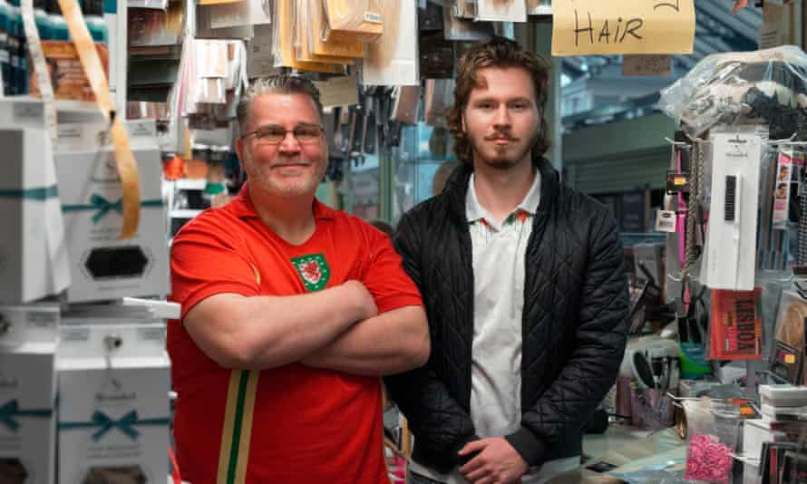 Andy Smith and his son, Jacob, at Andy's Hair Hut in Cardiff Market.